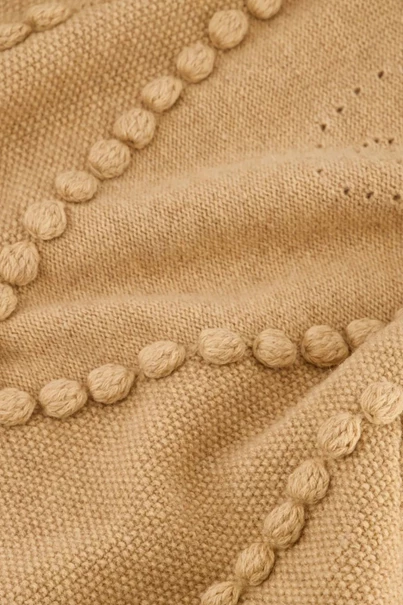 Fabienne Chapot poppy pullover knoop detail